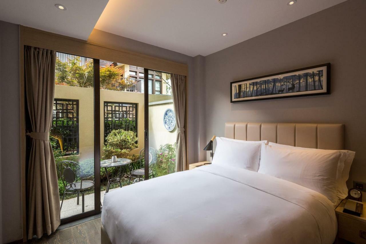 Howard Johnson Jinlin Plaza Lijiang Лицзян Экстерьер фото